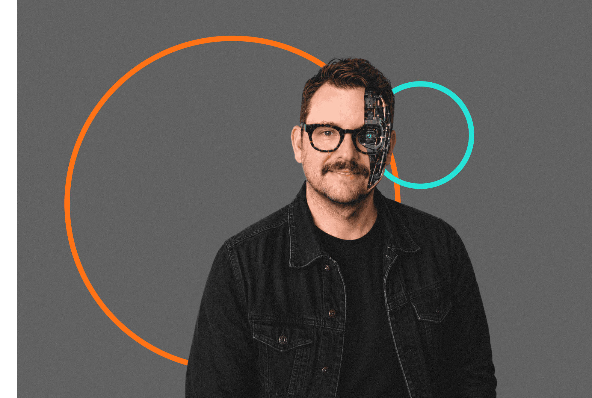 Portrait of George in glasses and a dark denim jacket, part of his face shown as robotic circuitry, with orange and teal circles on a grey background.